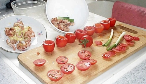 Grey shrimp snack with cherry tomatos